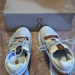 On Cloud White and Brown Sneakers